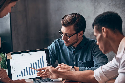 team reviewing analytic charts